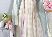 The Charm of Cheongsam,Shawl,and Capelet:A Blend of Traditional Elegance and Modern Fashion