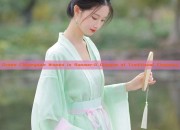 Green Cheongsam Women in Summer:A Glimpse of Traditional Elegance