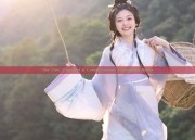 The Chic Charm of a Cream-Colored Cheongsam Dress