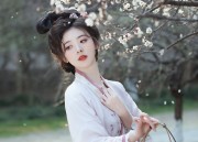 Red Puff-Sleeve Skirt and Ear Jewelry:A Blend of Traditional Elegance and Modern Charm