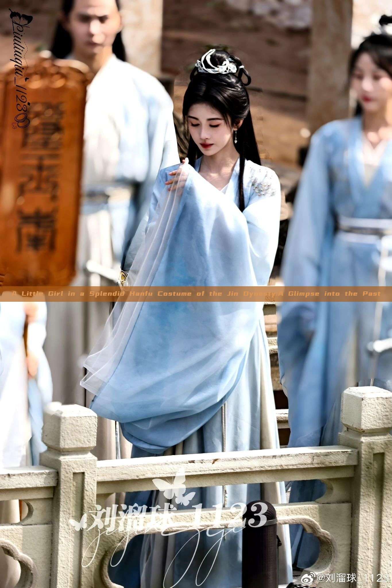 A Little Girl in a Splendid Hanfu Costume of the Jin Dynasty:A Glimpse into the Past A Little Girl in a Splendid Hanfu Costume of the Jin Dynasty:A Glimpse into the Past