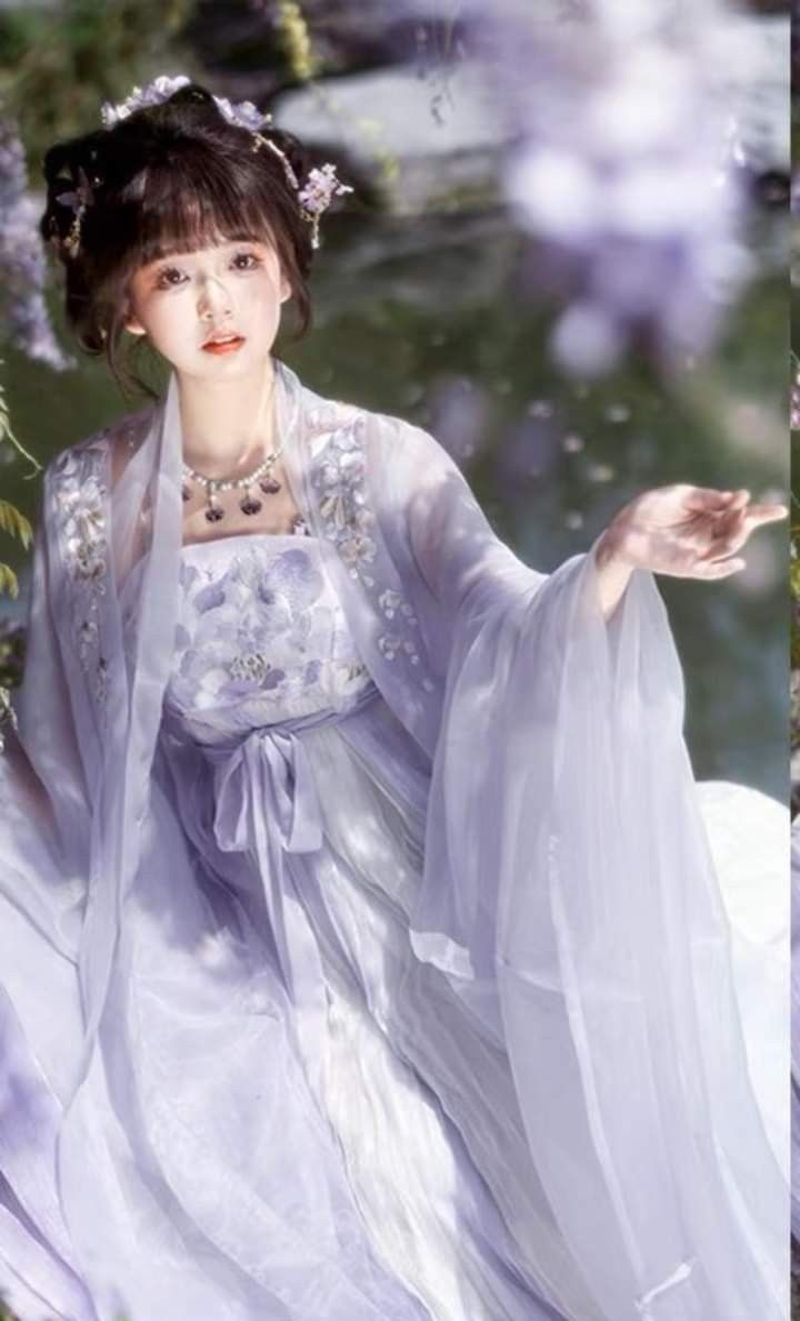 蟒纹唐装,中国传统服饰的华丽展现 蟒纹唐装,中国传统服饰的华丽展现