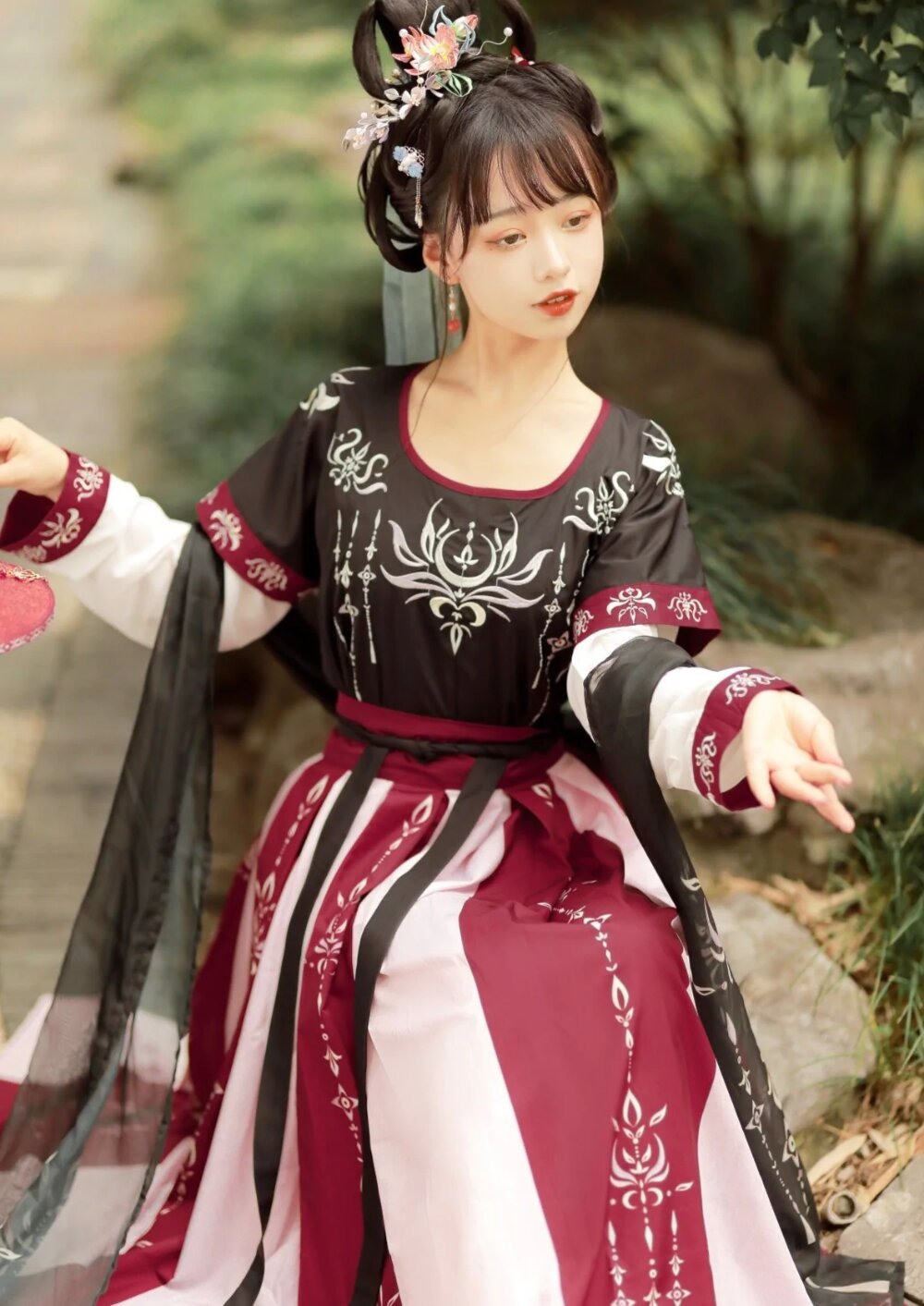 Reimagining the Classic Cheongsam in a Modern Black Dress Reimagining the Classic Cheongsam in a Modern Black Dress