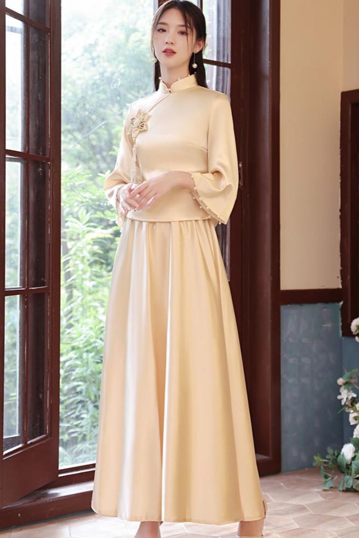 The Elegance of Cheongsam at the Wedding Banquet:A Cultural Blend of Tradition and Modernity The Elegance of Cheongsam at the Wedding Banquet:A Cultural Blend of Tradition and Modernity