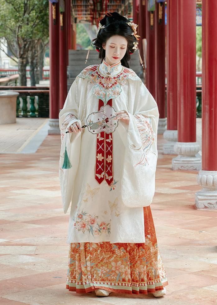 The Splendor of a Red Satin Cheongsam:A Cultural Icon of Chinese Elegance