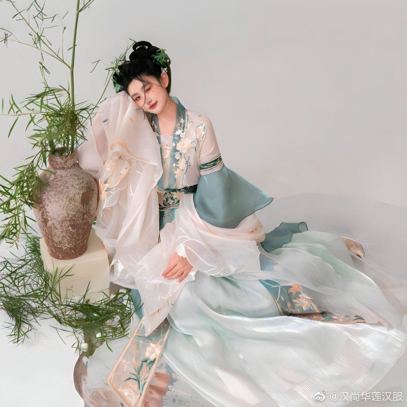 Classic Charm of Cheongsam and Cardigan:A Two-Piece Ensemble