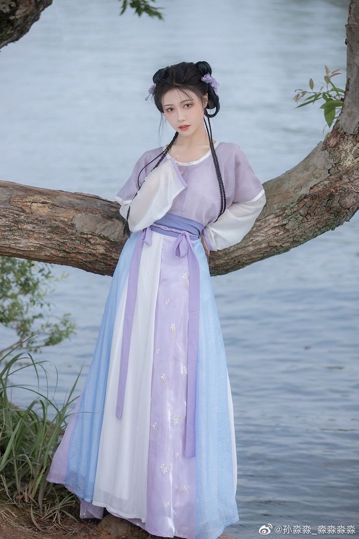 Reimagining the Traditional Cheongsam:An Enhanced Version of the Long-Style Reimagining the Traditional Cheongsam:An Enhanced Version of the Long-Style